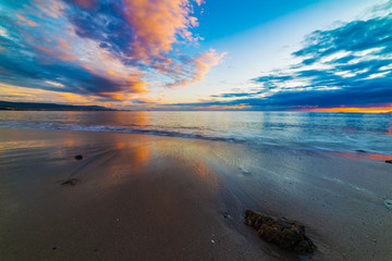 Fototapeta na wymiar Colorful sky over the sea at sunset