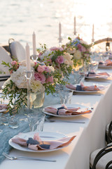 beautifully decorated table with flowers for wedding dinner