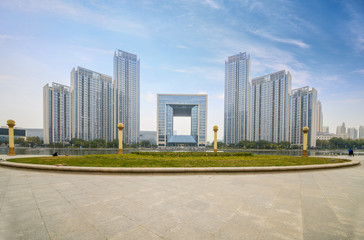 Fototapeta na wymiar empty tiled floor and urban skyline,tianjin china