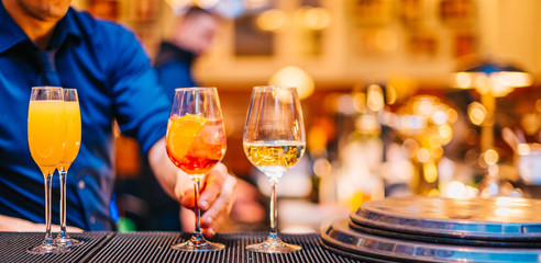 Bartender Serving Cocktails on Bar Party nightlife Background Alcohol Drinks