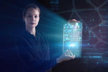 The concept of business, technology, the Internet and the network. A young entrepreneur working on...