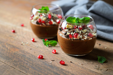 Chocolate Mousse Served with Pomegranate Seeds and Mint, Delicious Dessert