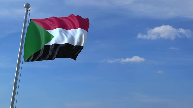 Commercial airplane landing behind waving Sudanian flag. Travel to Sudan conceptual animation