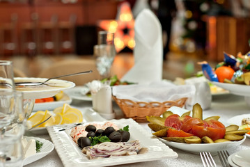 delicious dishes on the table in the restaurant. serving table.
