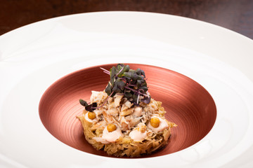Crab meat, fermented tomato and pine emulsion, fried chickpeas on young cabbage