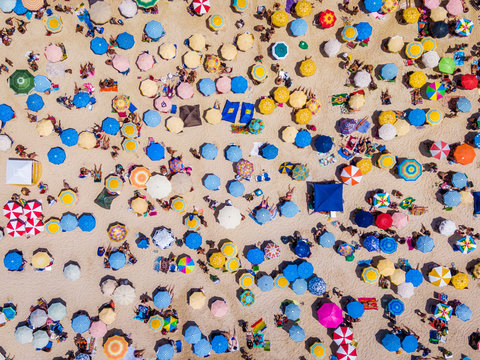 Top View of Copacabana Beach Showing Colourful Umbrellas and People Relaxing on a Summer Day, Tropical Vacation and Travel Concept, Rio de Janeiro, Brazil