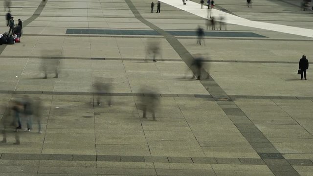 Right pan Time-lapse of Unidentified people on a forecourt in Paris La-d&radic;&copy;fense - Europe