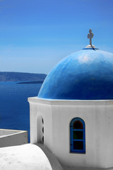 Fototapeta na wymiar The dome of the church on the island of Santorini in Greece