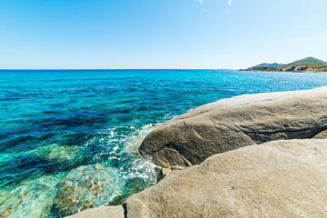 Rocks and blue sea in Sant'Elmo shore