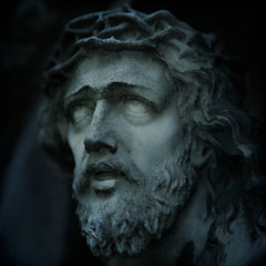 Fototapeta na wymiar Marble antique statue of suffering of Jesus Christ crown of thorns. Religion, faith, death, resurrection and eternity concept.