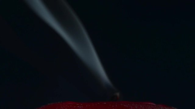 Candle on black background. snuff out the candle