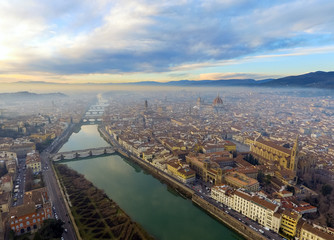 Obraz premium AERIAL. Panorama of the city of FLORENCE in Italy with the dome and Palazzo della Signoria and arno river