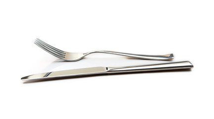Glossy cutlery, fork, knife isolated on white background 