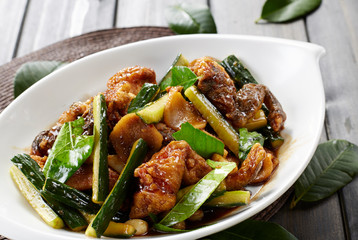 Stir fried frog with cucumber and lemon leaf