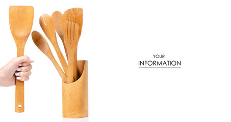 Wooden kitchen tools in a hand pattern on a white background isolation