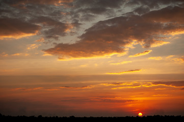 Silhouette image beautiful sunshine and colorful light,Thailand,selective focus,minimal sun and the sky