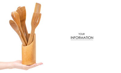 Wooden kitchen tools in a hand pattern on a white background isolation