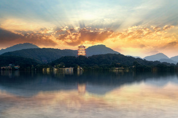 Ancient Chinese Pagoda at Sunset, West Lake, Hangzhou, China