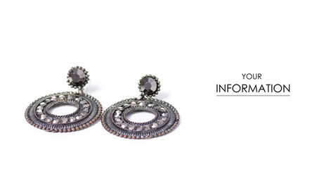 Black earrings stones jewelry bijouterie pattern on a white background isolation