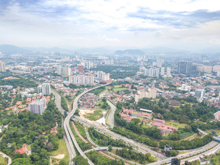 Fototapeta na wymiar KUALA LUMPUR, MALAYSIA - AUGUST 19, 2017: Aerial view of metropilitan city at daylight.