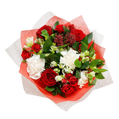 Colourful blossoming flower bouquet wrapped in paper and tied with a ribbon. Isolated on white. Top view.