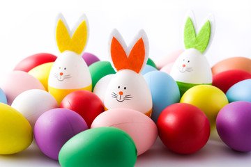 Easter holidays concept with colorful easter rabbits  and colorful easter egg on white background