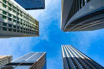 Fototapeta na wymiar Upwards View of Multiple Skyscrapers in Downtown Chicago