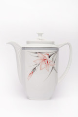 Porcelain teapot on the white background