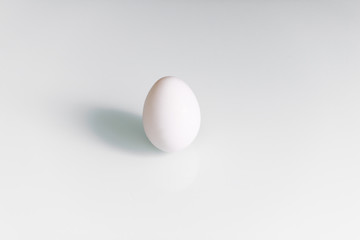 White egg is isolated on a white background. Concept Of Easter. Concept of healthy eating.