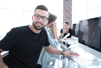 Fototapeta premium Team young professionals having casual discussion in office