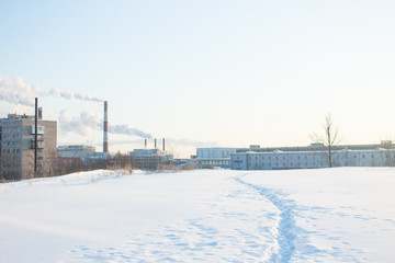 urban winter landscape. smoke from the chimneys