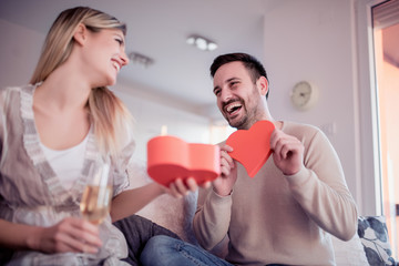 Man giving a gift to his girlfriend