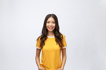 Happy young asian woman with blank copy space area for text or slogan,Closeup portrait of beautiful Asian woman,girl,Positive human emotion facial expression,isolated on white background