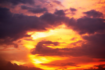 Rays of light shining through dark clouds for background