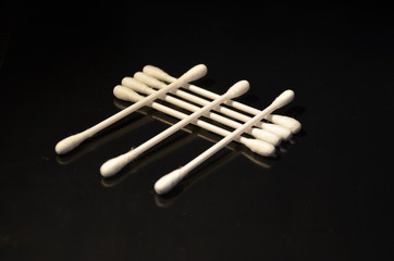 Cotton swabs on a black background 3