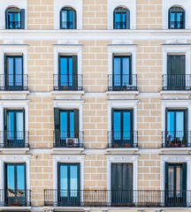 Fototapeta na wymiar decorated and classical facade in Madrid city