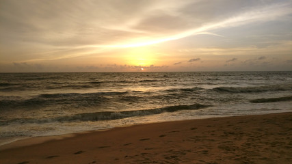 Naklejka na ściany i meble sunset on beach