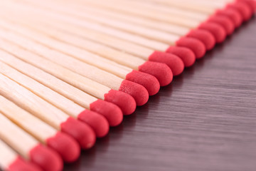 Red matches in a row, background