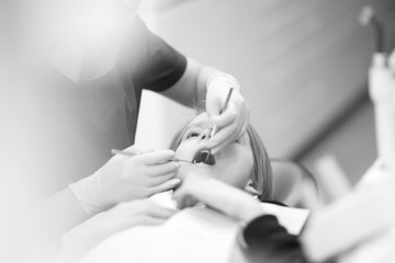 Obraz premium Boy of school age at the preventive reception at the dentist in the clinic