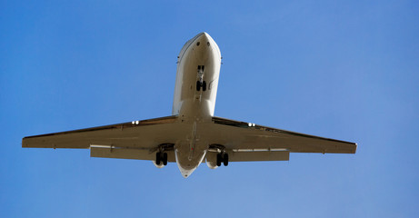Passenger plane departing in afternoon