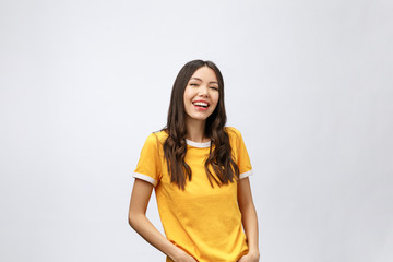 Young friendly Asian woman with smiley face isolated on white background