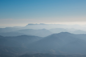 Fototapeta na wymiar Mountains with fog