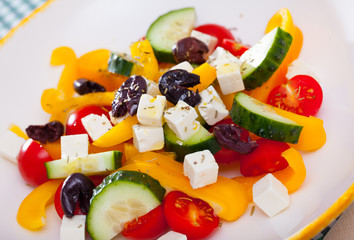 Greek vegetable salad with cheese and olive oil