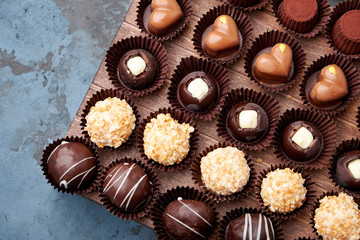 Chocolate handmade candies, pralines and truffles in assortment. 