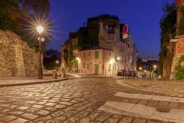 Fototapeta na wymiar Paris. Old street on the Montmartre hill.