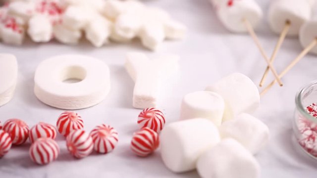 Close up view. Variety of marshmallow toppings with peppermint for hot chocolate and cocoa drinks.