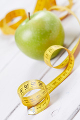 apple with measuring tape