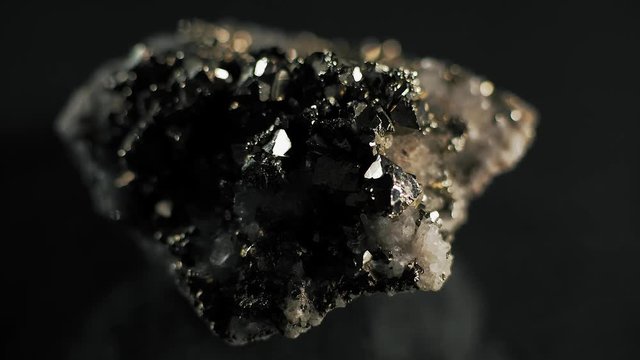 Macro, Crystals Quartz in the Mountain Mineral on the Black Background