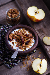 Homemade  granola with yogurt. style vintage.