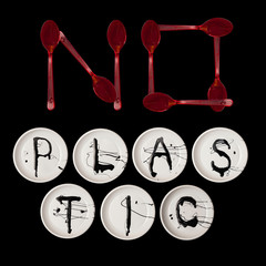 No plastic: plate, fork. Text, calligraphy, lettering, doodle by hand isolated on black. Eco, ecology.